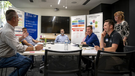 A group discussing business growth strategies may have learnt some lessons from the school of hard knocks